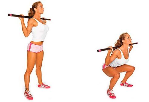 squats with a bodybar for slimming sides and abdomen