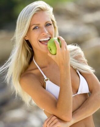 a girl eats an apple for weight loss by 10 kg per month