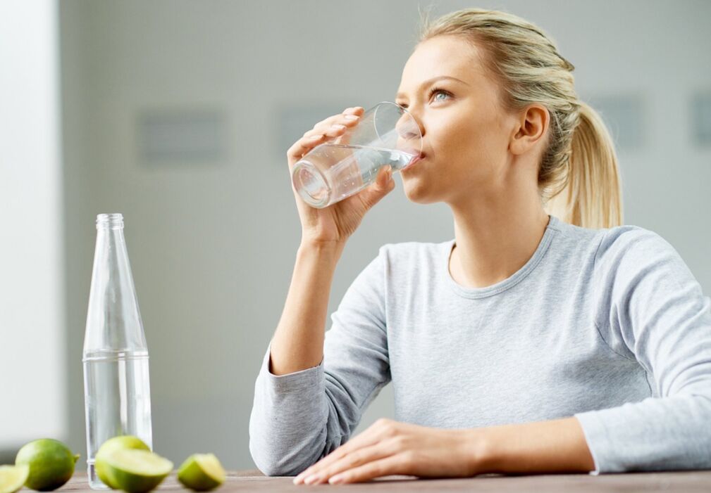 The girl drinks water